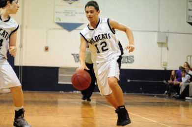 Junior Shane Potter drives to the basket in a 2012 game