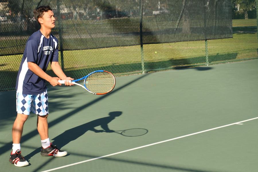Junior Kha Duong waits to return a serve during a match against Melbourne High on Wednesday,