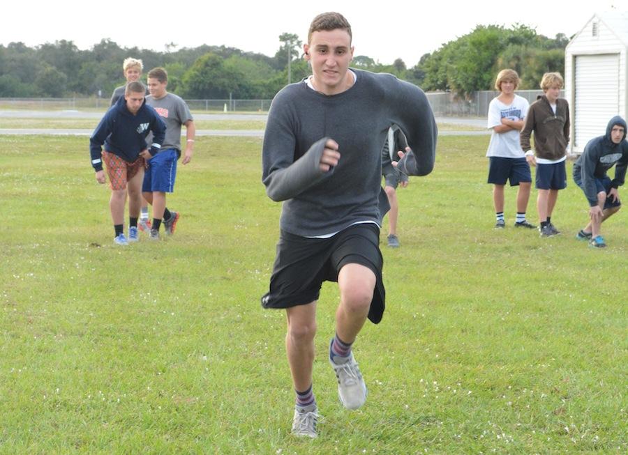 Senior Chris Melchiori runs sprints during lacrosse practice Wednesday afternoon.