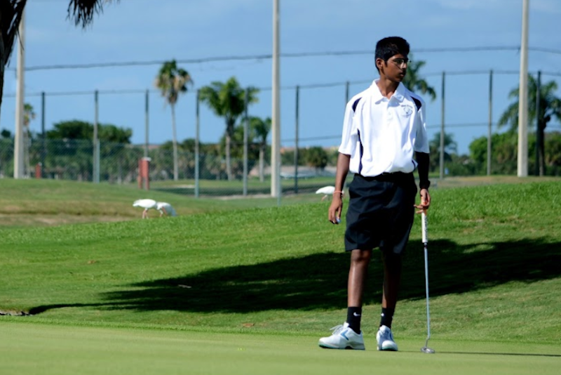 Freshman Kishen Mitra eyes his putt