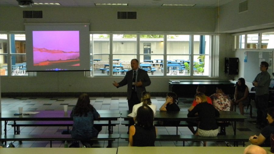 Mr.O explains what the trip will be like to the parents of students that wish to attend