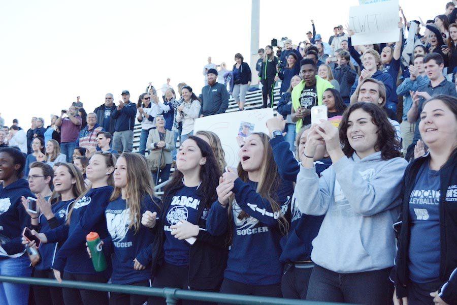 Fans react as the state championship soccer game on Thursday.
