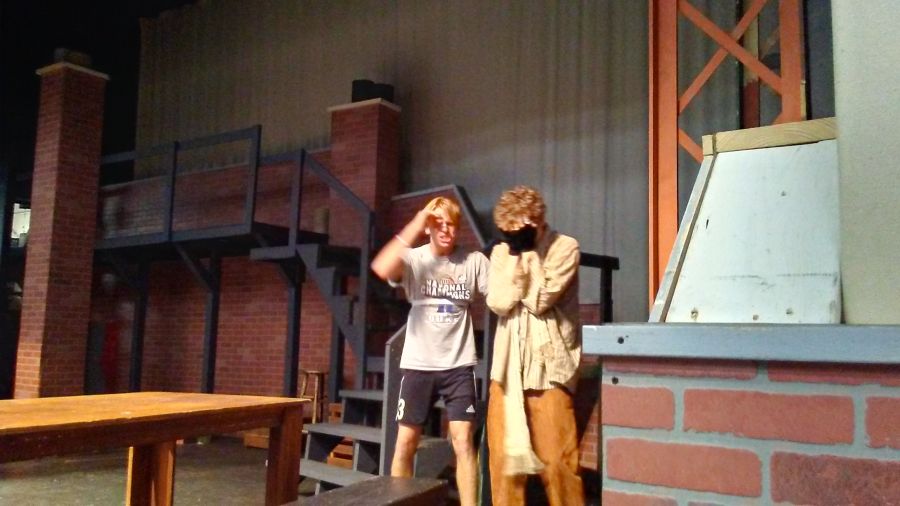 Juniors Kyle Caudill and Evan Courtney rehearse an intense scene the week before opening night.