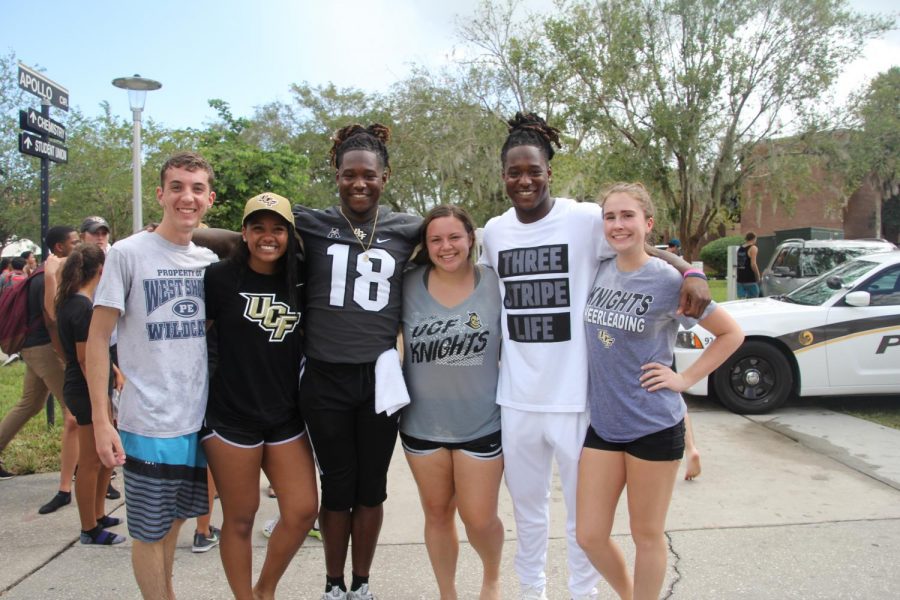 Seniors McKenzie Curtis, Mariah Jones, Malea Nelson and Max Kohlstedt  meet the Griffin brothers at UCF.