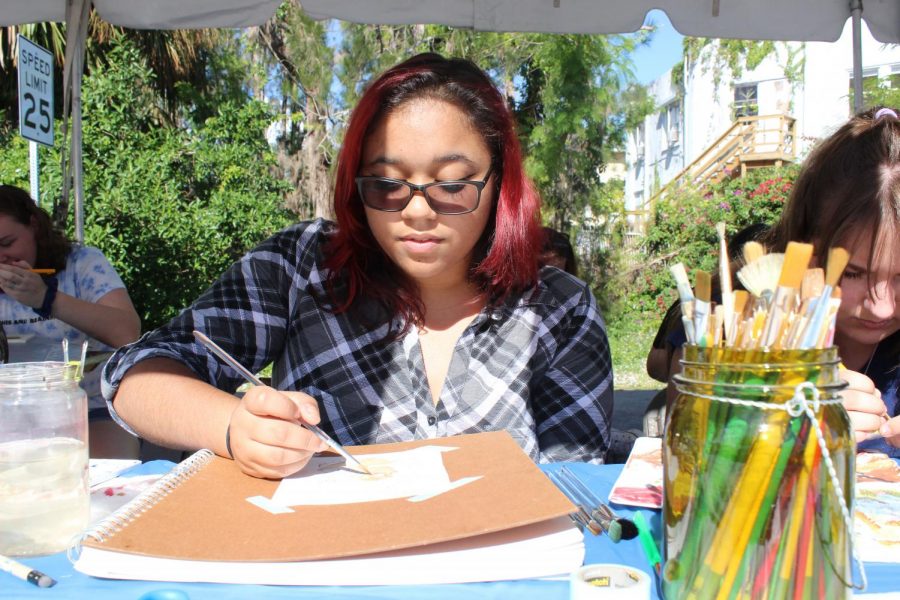 Sophomore Christina Lawson participates in the art festival.