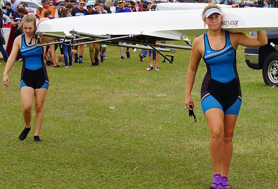 Satellite Highs Trinity Purcell and senior Marissa Scalise prepare for a race.
