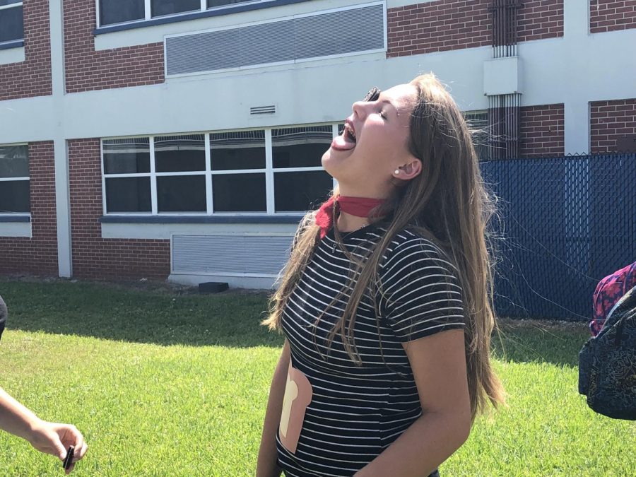 Punday Monday featured students, such as senior Lydia Howald, playing a game between buildings 2 and 3 where the objective is to maneuver an Oreo from their forehead to their mouths without touching it with their hands. 