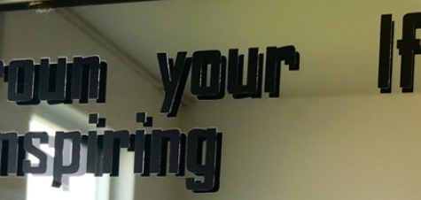 Mental health awareness stickers defaced in restrooms