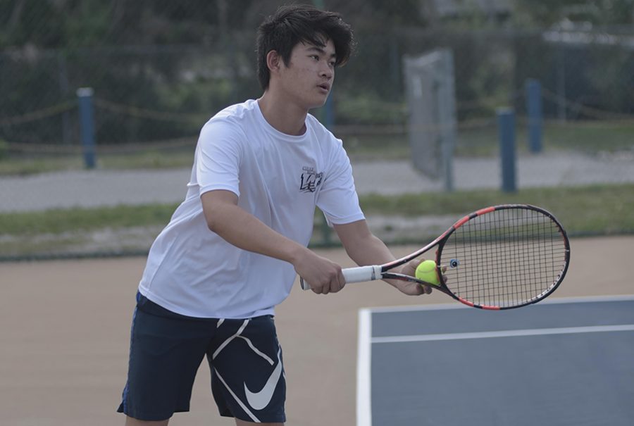 Sophomore+Nathan+Foo+hopes+to+reclaim+his+line+one+position+as+he+prepares+to+battle+challengers+during+tryouts.
