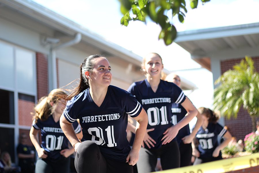 The Purrfections dance team performs a hip-hop routine at the Blue Ribbon Celebration on Friday.