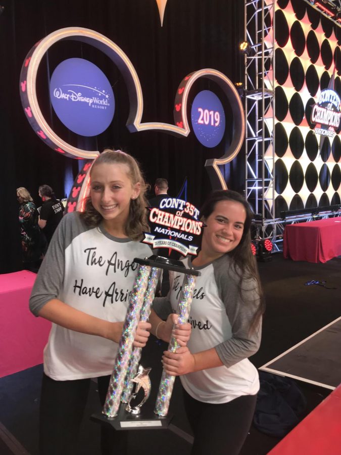 Macie Goldfarb and Kathryn Carrick celebrate winning first place at nationals 