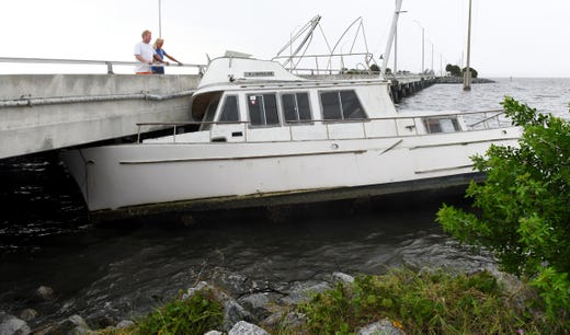 Crashed boat in the Sebastian Inlet bridge bridge caused by Hurricane Dorian.