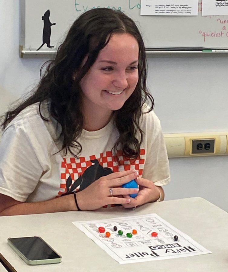 Senior Riley Harper plays Harry Potter themed bingo at the Harry Potter club meeting on Tuesday April 5, 2022 in Mrs. Tamara Reiss classroom. Harper won a round of bingo and received a box of jelly beans as a prize.