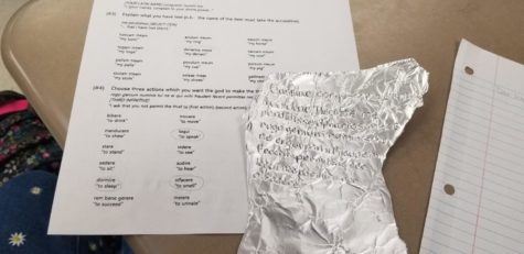 Students in all Latin classes participated in carving curses from ancient Rome into curse tablets made of aluminum foil. 