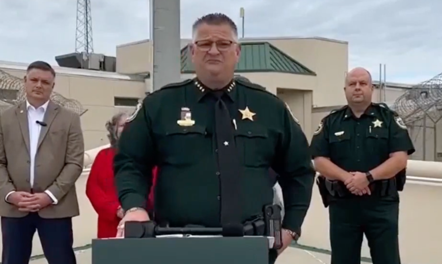 Board Chairman Matt Susin and Sheriff Wayne Ivey hold a press conference outside the Brevard County Jail.