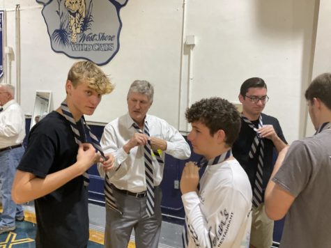 The Tied Together event — designed to teach boys the importance of character — was held in the gym on March 24.