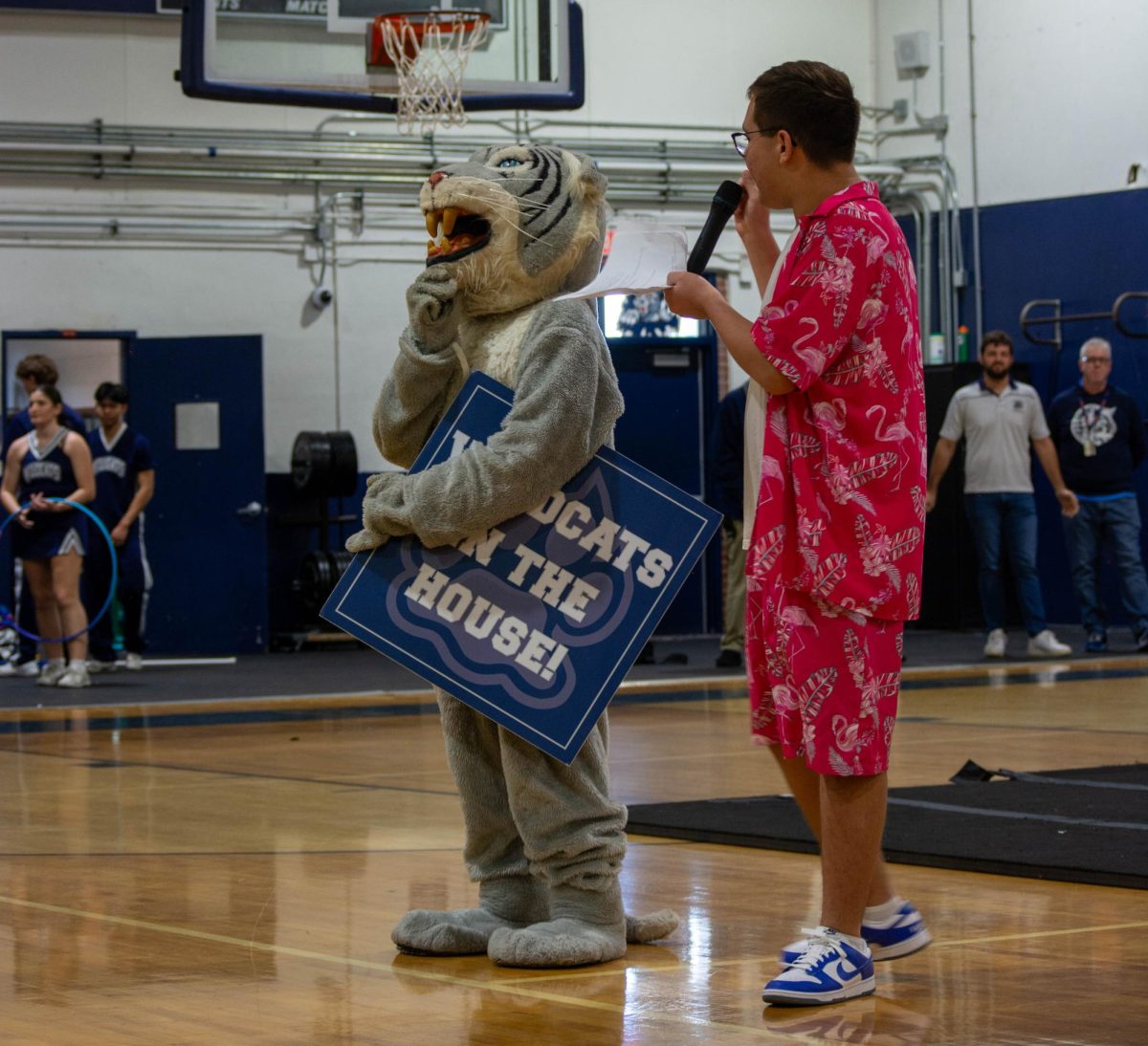 Sophomore Robert Santiago and Wesley the Wildcat get the wildcat nation excited for our winter sports athletes during the pep rally in the gym on Jan. 16.