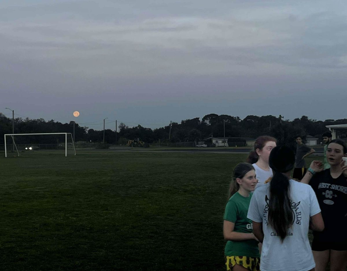 After an intense workout on the morning of January 25, Track athletes soak in the red moon while the last day of track conditioning ends. “It was very symbolic,” Sophomore Jayden Collins said. “It marked the moment where conditioning ends, and the real competitive season starts.”  