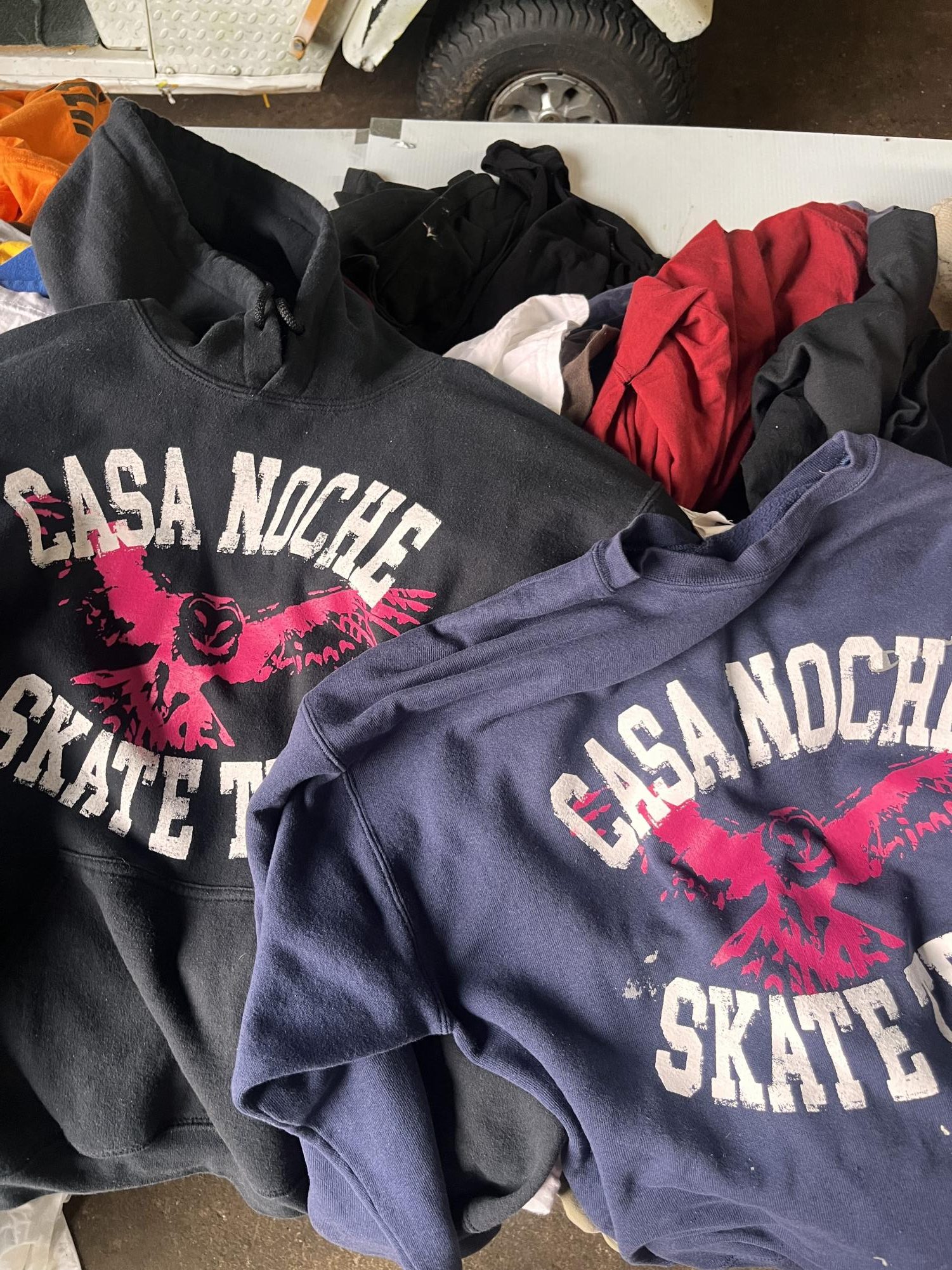 In preparation for a pop-up event, business owners Jonah Vignier and Isaiah Greenidge set up Casa Noche skate merchandise. We have got to find the right clothes [for the audience], Greenidge said. If we have a bunch of music tees, were gonna go to the music store. If weve got a bunch of sport shirts, were gonna go to Dicks Sporting Goods.