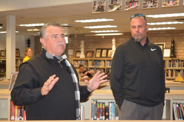 Principal Rick Fleming introduces Rockledge High School’s current principal Burt Clark to the West Shore faculty Thursday after school.