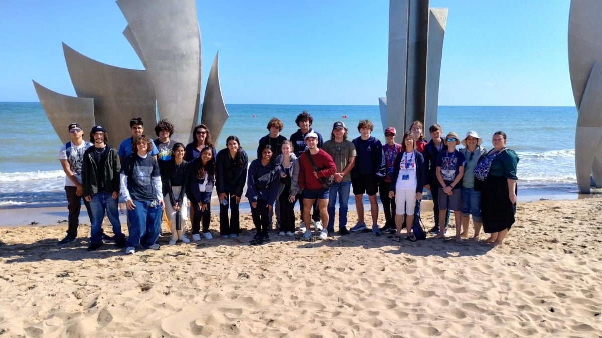 Students, teachers, and parents visit Omaha Beach in Normandy, France on June 7. "In 7th grade I had signed up for a [field trip to] Canada but it was canceled because COVID pushed it off so much, so when Mrs. Pietrzak brought up that they were doing a D-Day field trip to Europe, I thought that was really cool and I knew that I definitely wanted to do a trip while I was at West Shore so I took the opportunity," senior Amelia Bailly said.