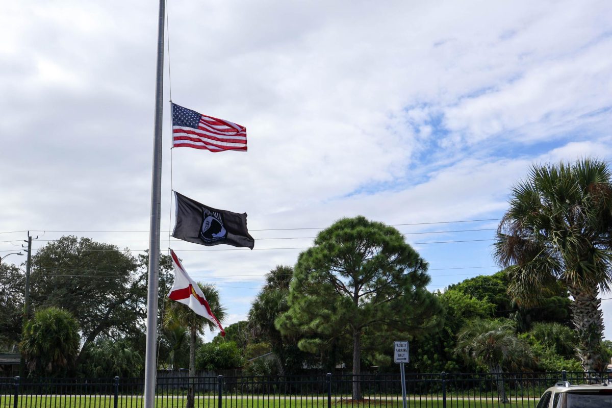 The American flag flies at half mast outside of the school on Sept. 11 in honor of Patriot Day. Students participated in a moment of silence during the morning announcements honoring the many lives lost 23 years ago today.