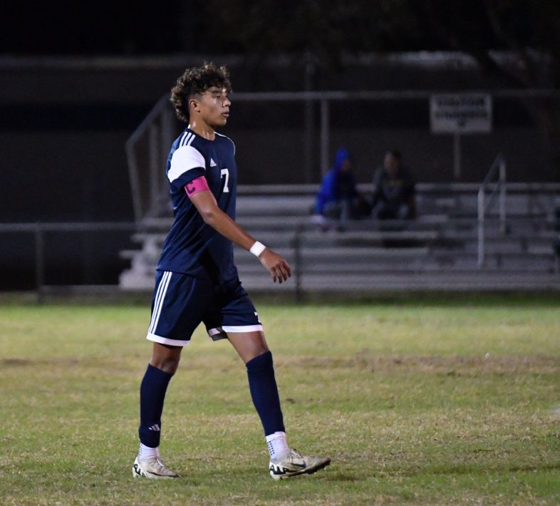 Boys' varsity soccer captain and senior Athan Zaiden walks across the field during a home game against Titusville High School on Dec. 10. West Shore won 5-0.