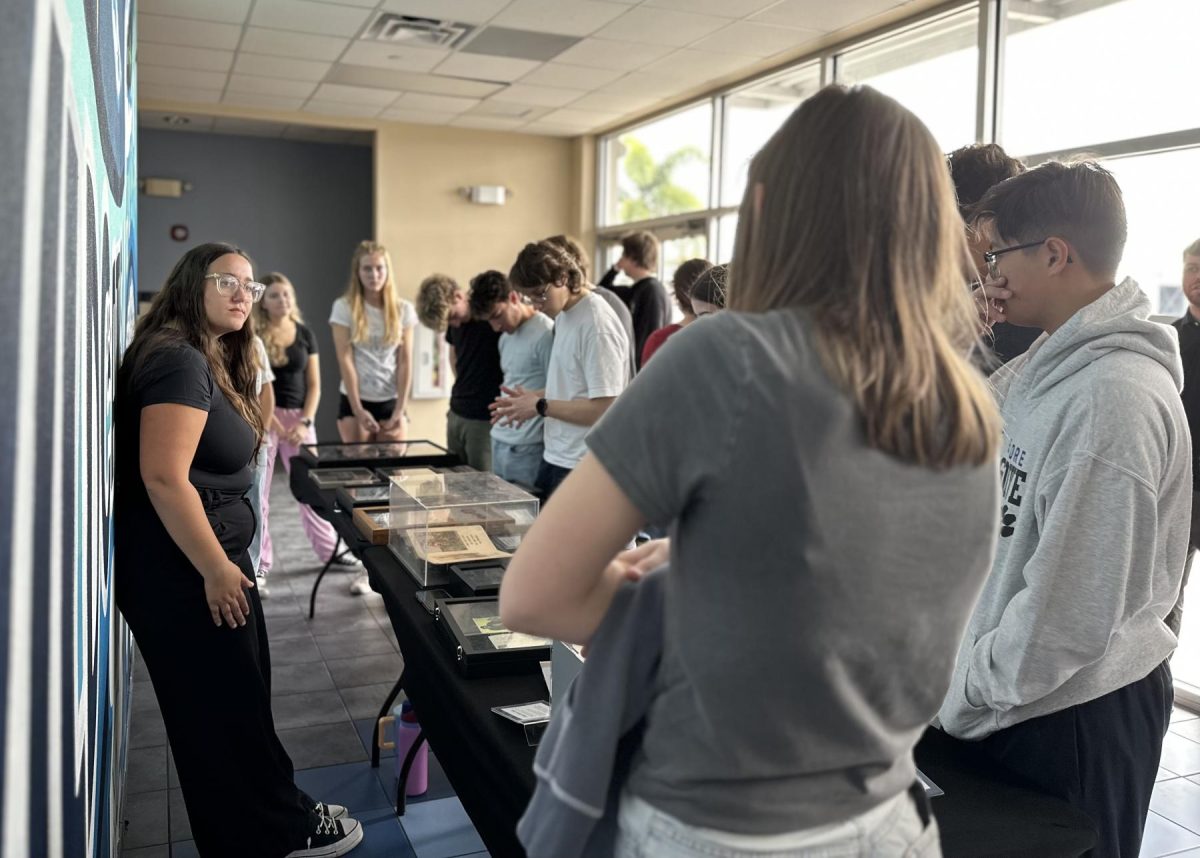 On Dec. 13, AP Government students look at Holocaust artifacts provided by ShadowLight, which is on its "The Hate Ends Now" tour. Students got to sit in a replica of a train car used to transport Jewish people during World War II. The "cattle car" had a 3D projector system and voiceovers by two survivors that narrated what the experience had been like. "Just being in an enclosed space that thousands of people were carried to their death in is a terrible feeling," junior Ava French said. "I was imagining myself in the shoes of Hedy and Nate while the movie was playing and I couldn’t help but cry thinking of the terrifying things they went through."