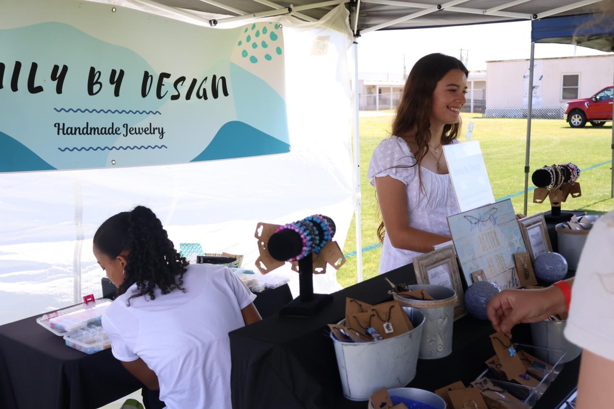 Sophomore Emily Moseley (right) sells handmade jewelry inspired by the ocean.
