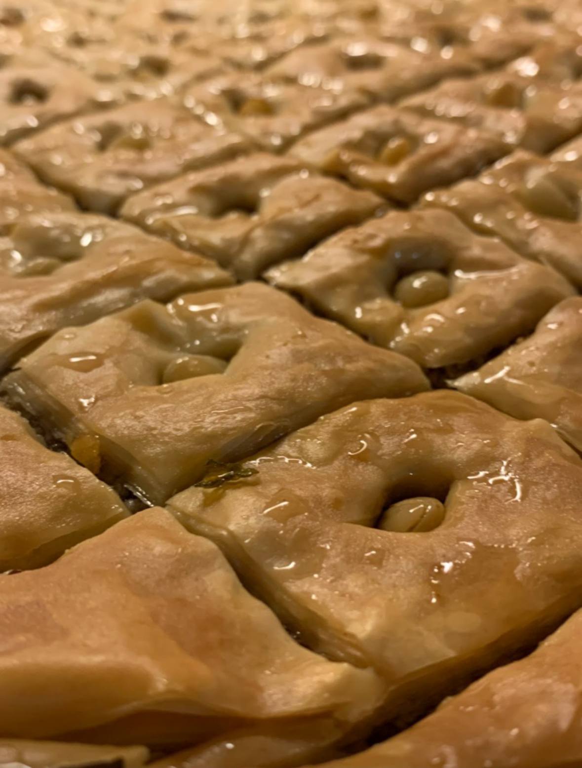 Finishing a batch of baklava, junior Hlla Waregh spent her weekend baking the pastry to share with her youth group.