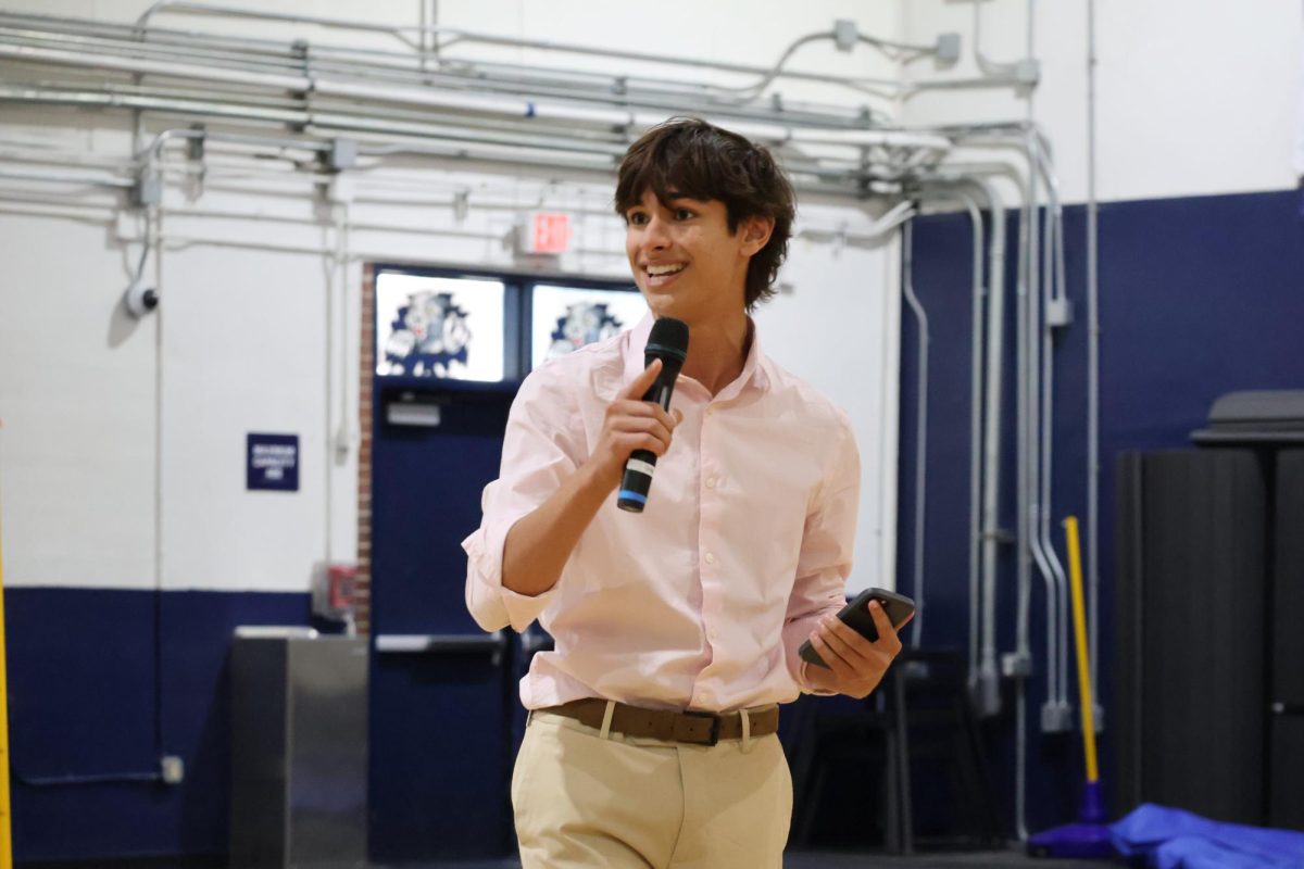 Junior Blake Johnson, who is running for senior class president, gives his campaign speech on April 23.