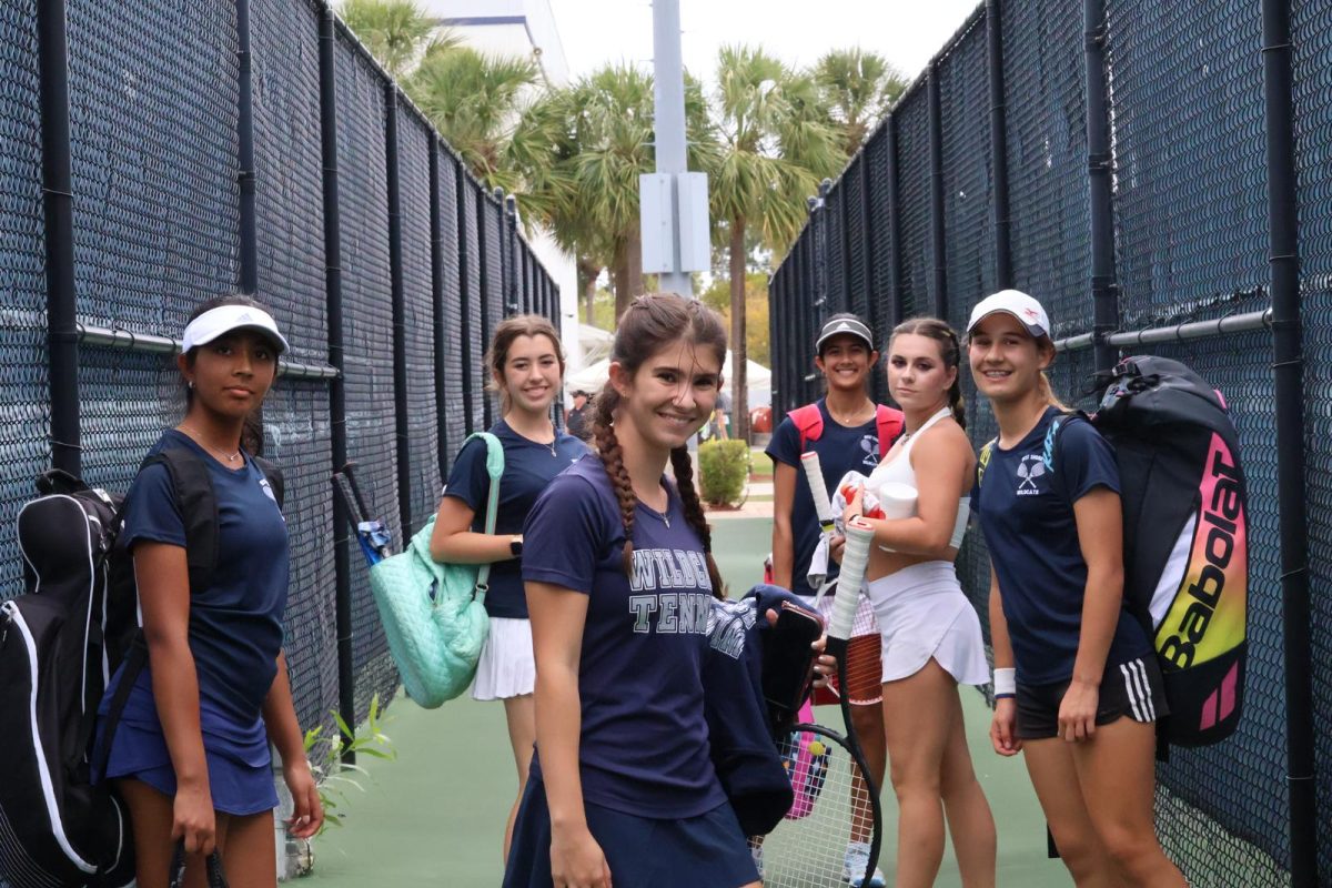 (from left to right) Freshman Nikita Sinha, freshman Ava Paullin, senior Aubrey Reiter, junior Rhea Sinha, senior Katherine Arcadier and seventh grader Sophia Goranovic pose before competing against Benjamin High School for the regional competition on April 22.