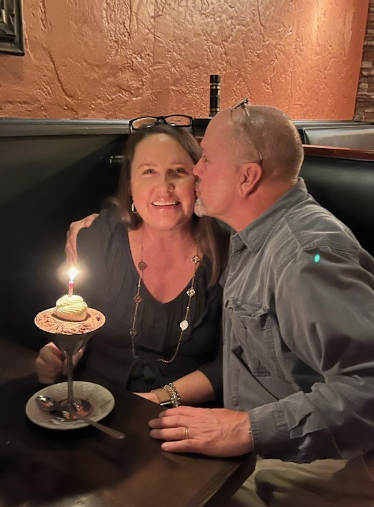 Sandi and James Finch celebrate Sandi’s birthday on Dec. 16, 2023, three months before she was diagnosed with leukemia.