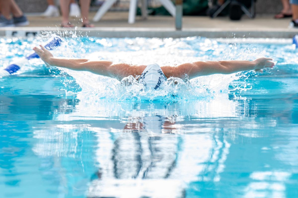 Senior Nicole Riopelle competes in the butterfly event  