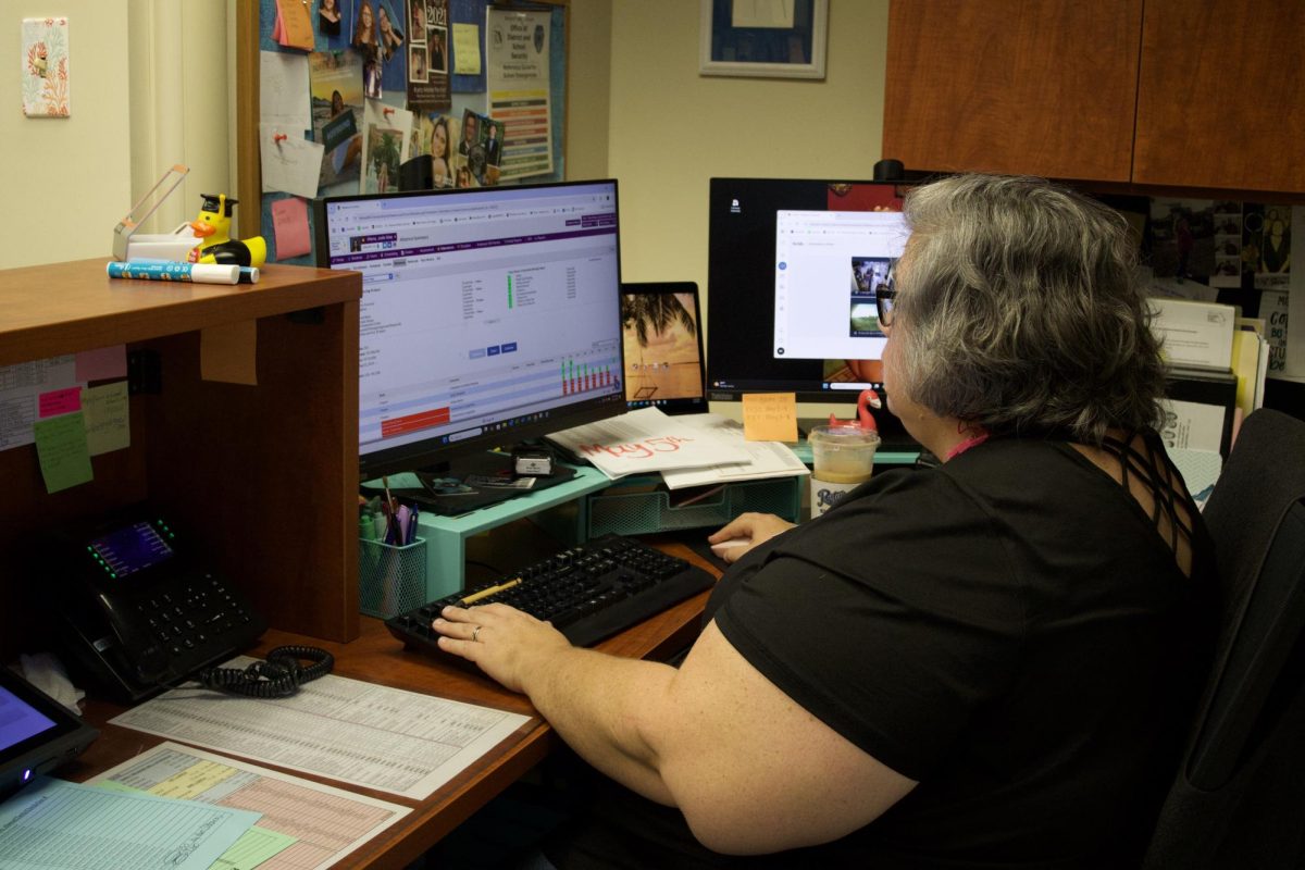 Attendance officer Kimberly Morin adjusts excused absences on May 2.