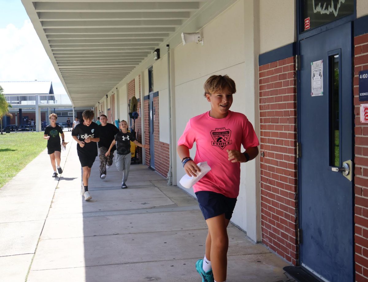 Seventh graders locate their next target during