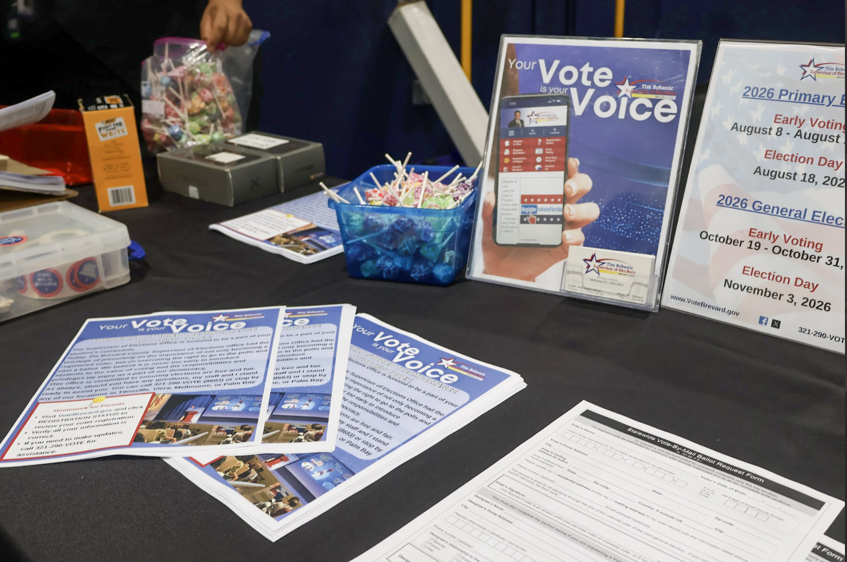 A table with voting and registration materials was set up in the gym while Tim Bobanic, the Brevard County supervisor of elections, gave a presentation to juniors and seniors on Sept. 25.