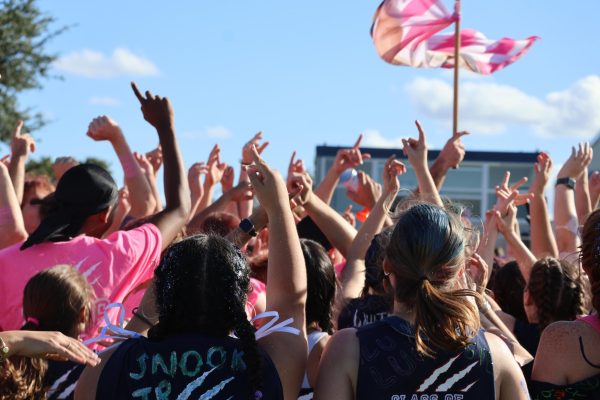 The senior class celebrates after winning powder-puff on Oct. 17.