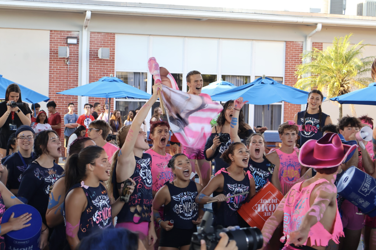 The seniors cheer against the juniors in the morning on Oct. 17. “I feel super hyped that we won,” senior Caelen Garcia said. “We had so much spirit leading up to the game. Especially in the rumbles, we yelled our cheers at the juniors, and I saw many of the juniors just standing there looking totally lost during the rumble. We really deserve it, and you could feel the hype after we won. We definitely got the crowd's love during the dance, too.”