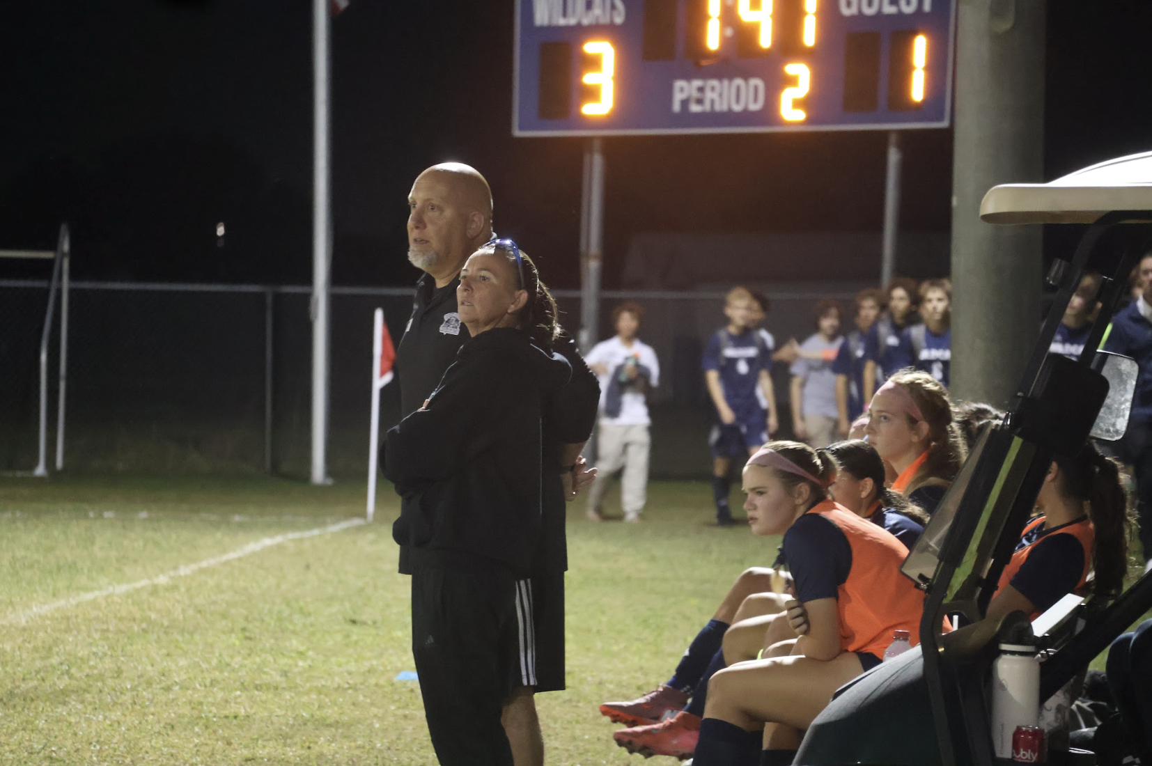 With under two minutes left in the game, assistant coach Mike Iorio and head coach Jenny Pazderak (front) stand on the sidelines of the girls varsity soccer match against MCC on Nov. 7. The girls took home the win 3-1.