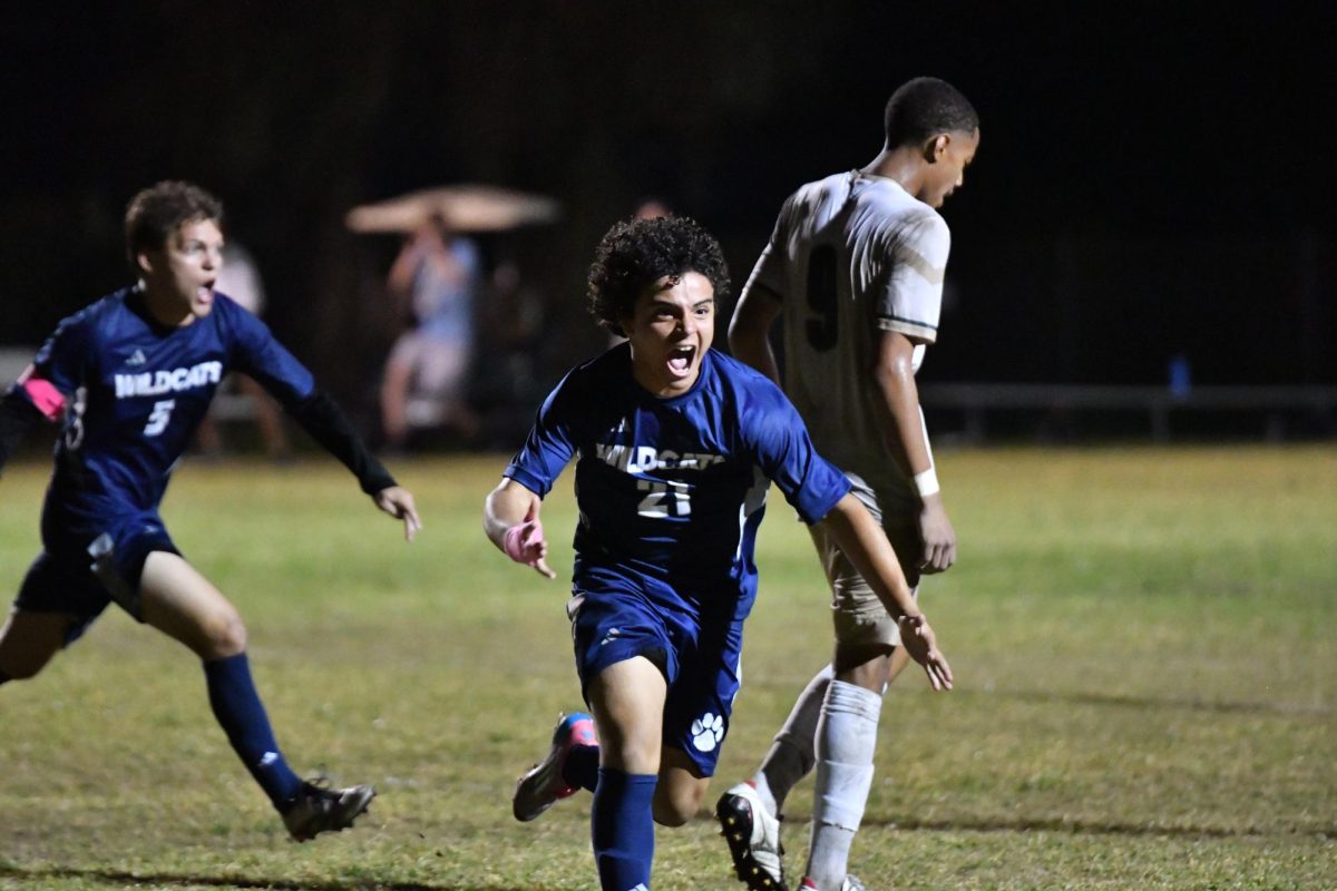 After the homecoming game on Nov. 7, freshman Sergio Prieto, outside midfielder, celebrates his goal. “Before I scored, I got a feeling [that] something was going to happen,” Prieto said. “After I scored, I was super happy, and there was a lot of energy in the crowd.” At the end of the game, the Wildcats beat Melbourne Central Catholic High School (MCC) 3-1. 