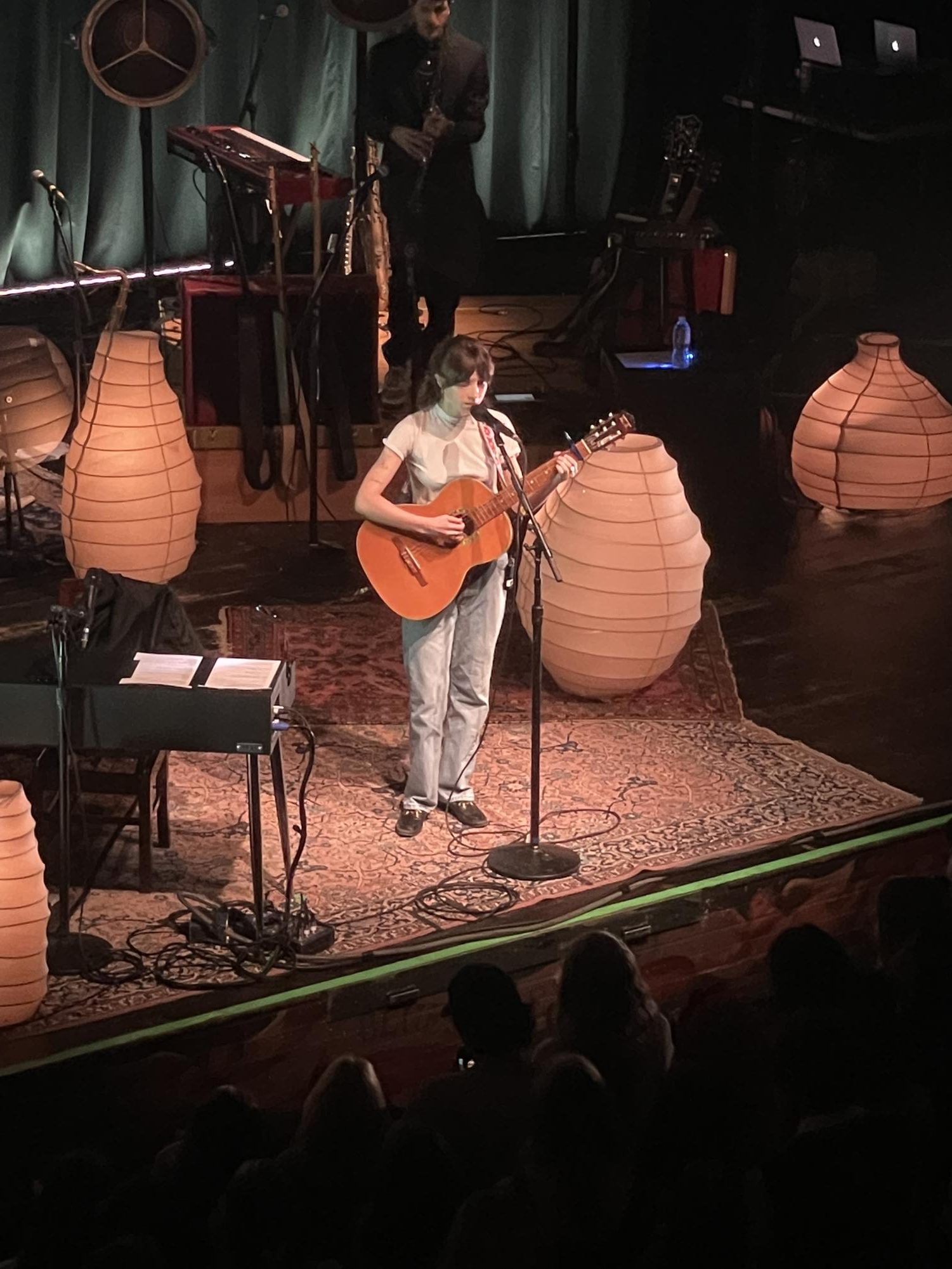 Singing at House of Blues in Orlando, Florida, singer-songwriter Clairo performs her album "Sling" to her fans.