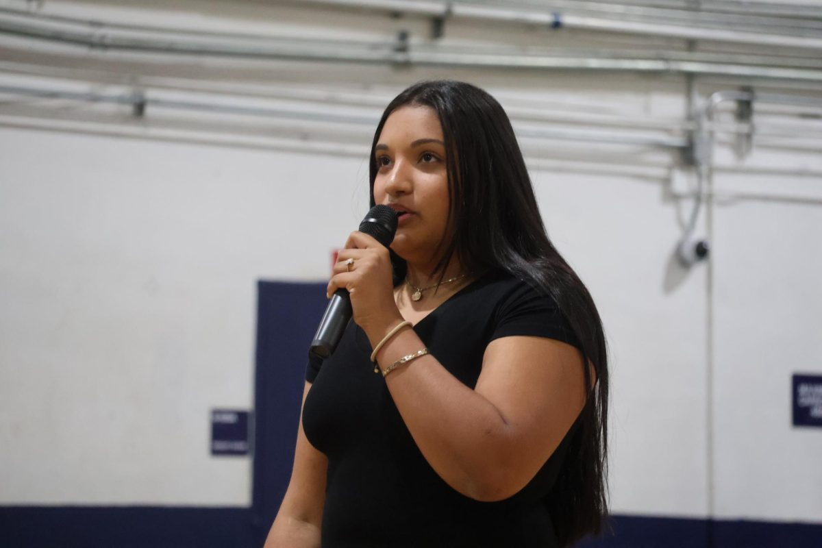 Giving her speech in the gym on Wednesday, April 22, senior class secretary candidate Emma Gonzalez-Mojica talks about her qualifications. 