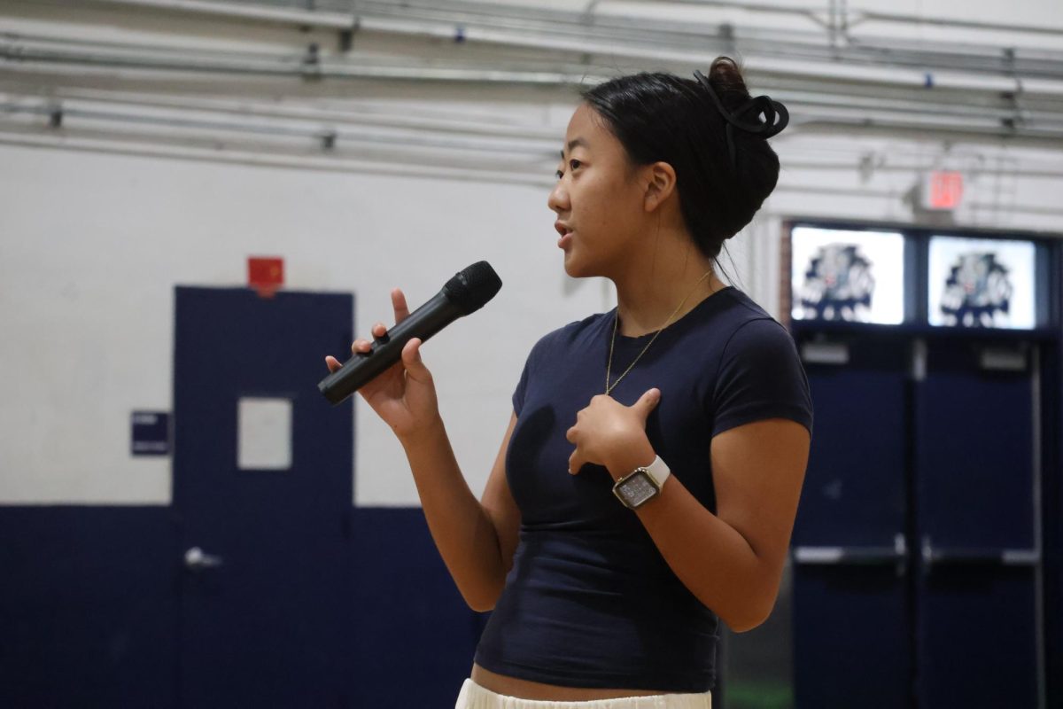 Talking to the incoming senior class in the gym on Wednesday, April 22, senior class secretary candidate Madison Shi shares why she believes she is the best candidate for the role.  