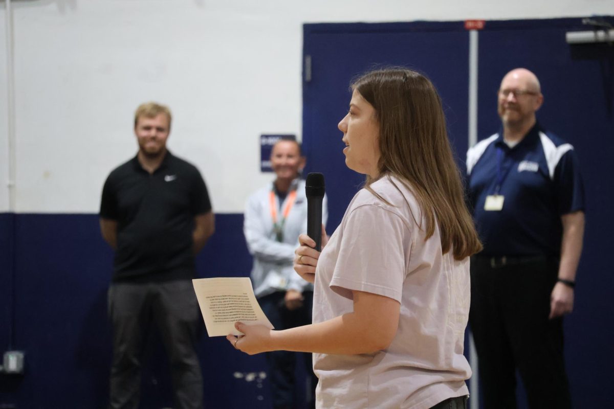 Giving her speech in the gym on Wednesday, April 22, senior class vice president candidate Sophie Ann Miles tells the audience why she believes she would be the best choice for the role. 
